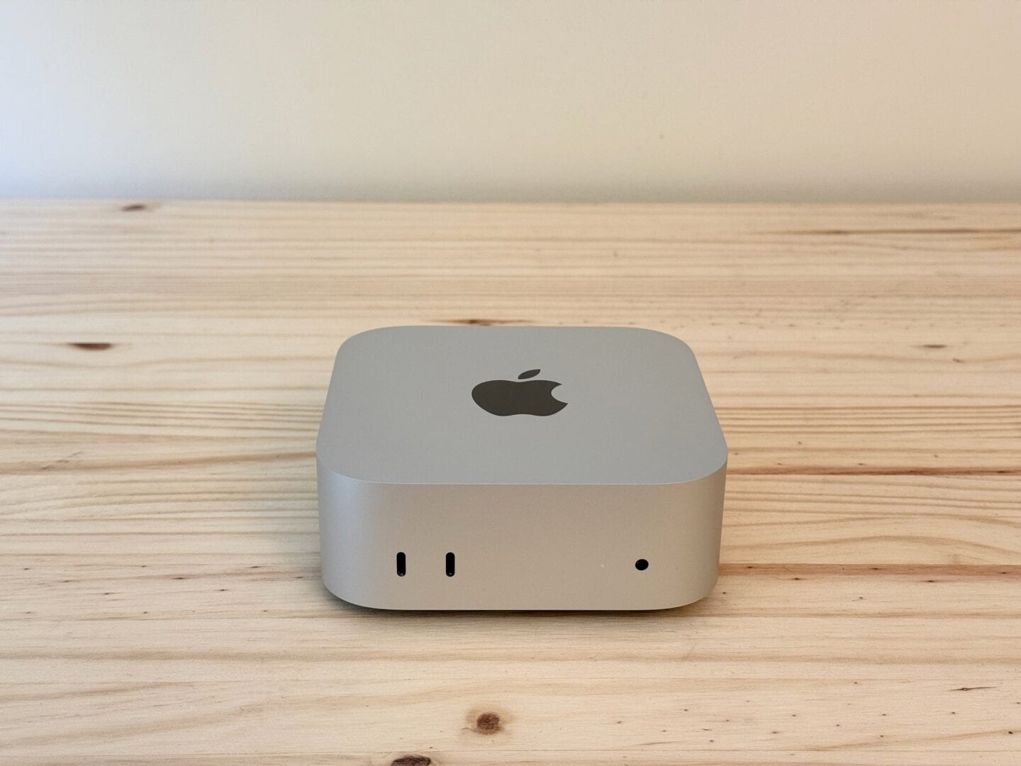 Mac mini M4 front Mac mini M4 pictured from the front, on a table