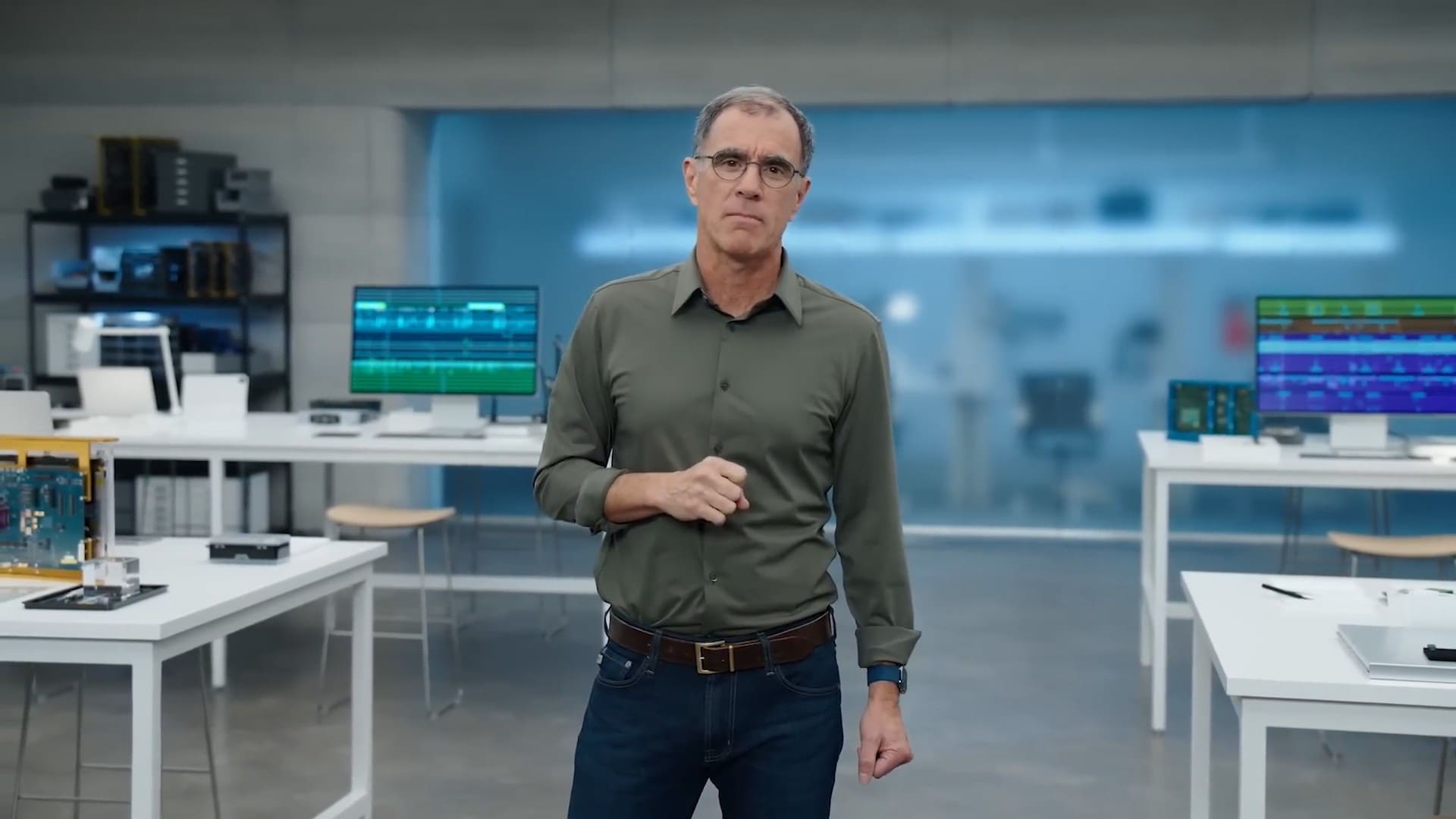 Vice President of Platform Architecture and Hardware Technologies at Apple, Tim Millet, standing in the Apple chip lab.